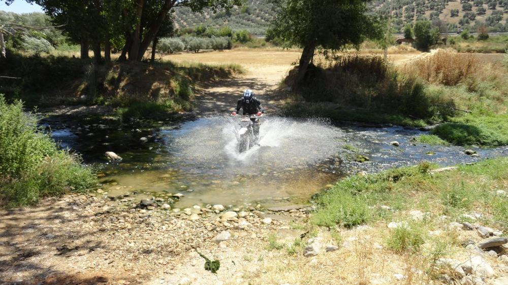 Superb water hazards on the our off-road motorcycle tour in Malaga