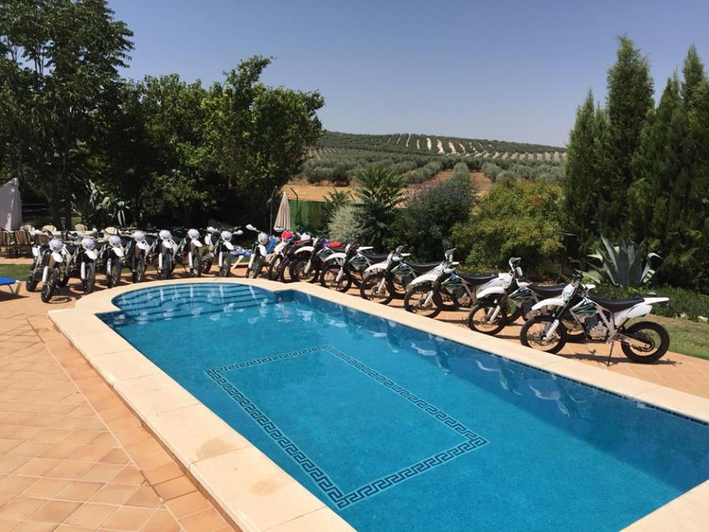 All our trail bikes lined up at the poolside 