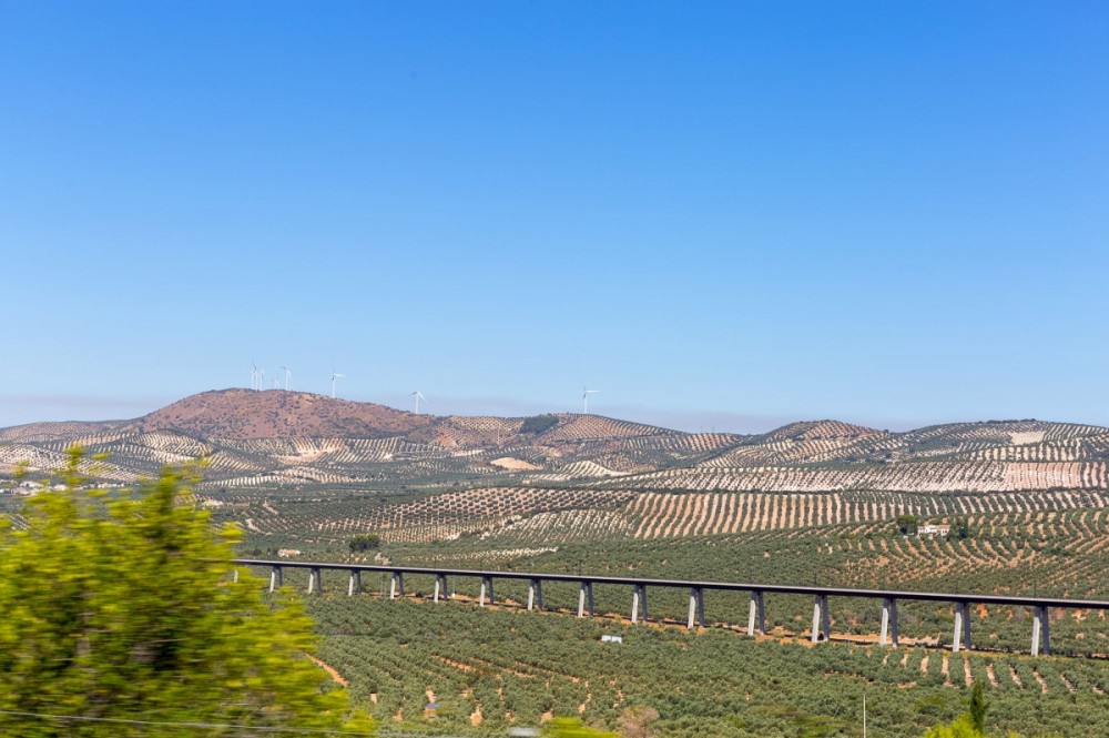 Ride your mx bikes across fields and under the railway line to reach Antequera